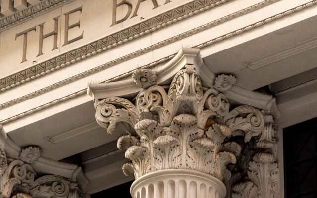 A detailed view of a classic bank building facade