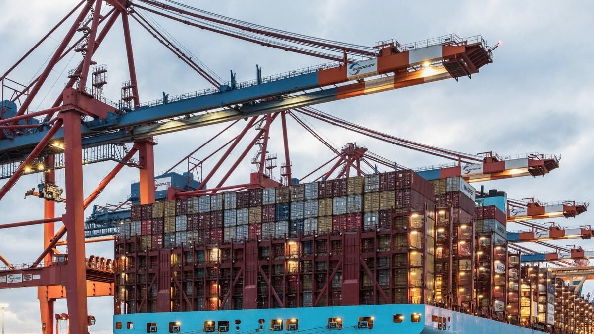 A cargo ship loaded with containers at Hamburg's bustling commercial dock