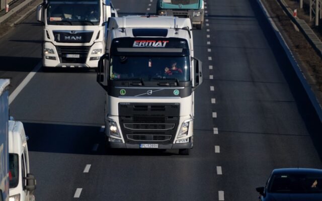 Heavy duty trucks driving on a highway