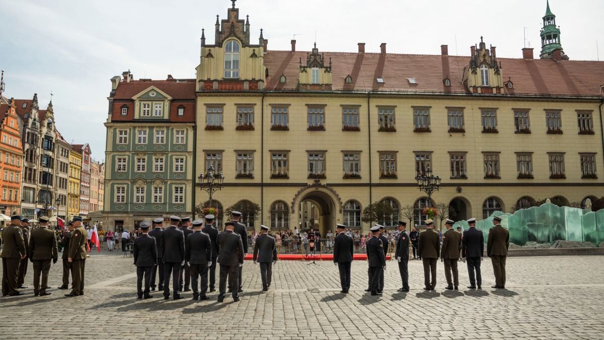A military ceremony in Market Square with soldiers standing in formation