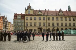 A military ceremony in Market Square with soldiers standing in formation