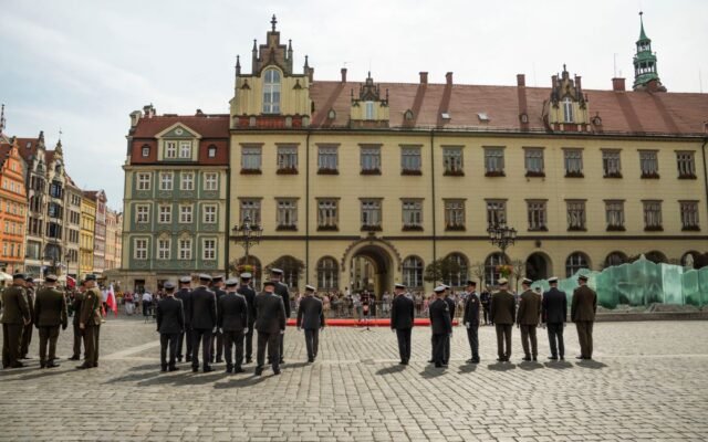 A military ceremony in Market Square with soldiers standing in formation