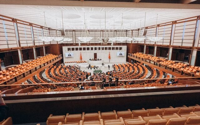 Wide-angle view of the Parliament's grand seating area