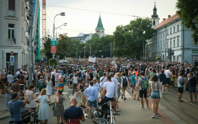 A large peaceful protest unfolds in city streets