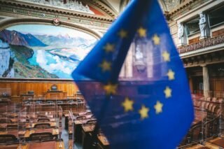 Close-up of European flag inside the Swiss Parliament chamber in Bern