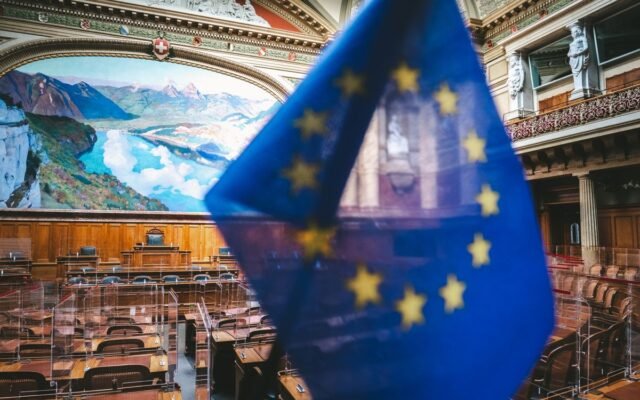Close-up of European flag inside the Swiss Parliament chamber in Bern