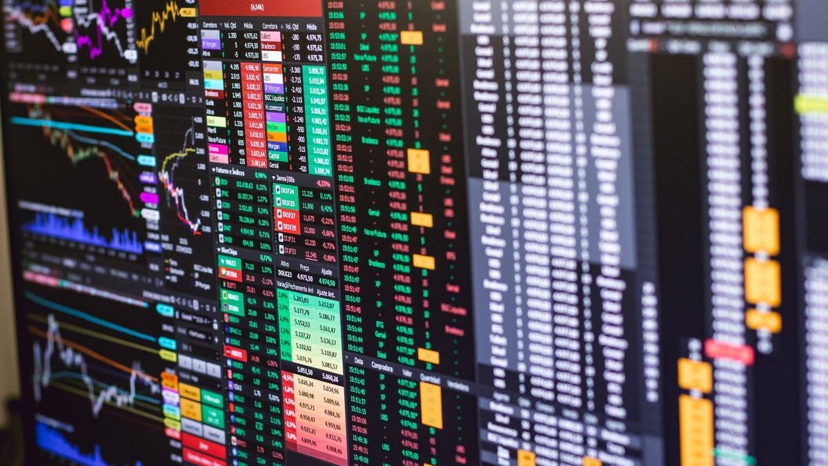 Detailed financial trading screen with colorful charts and data representing market fluctuations